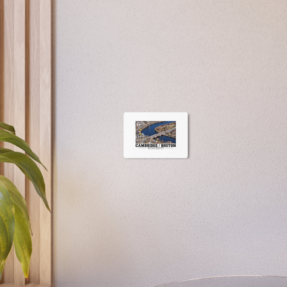 Eliot Bridge aerial river view metal print on a beige wall beside a plant