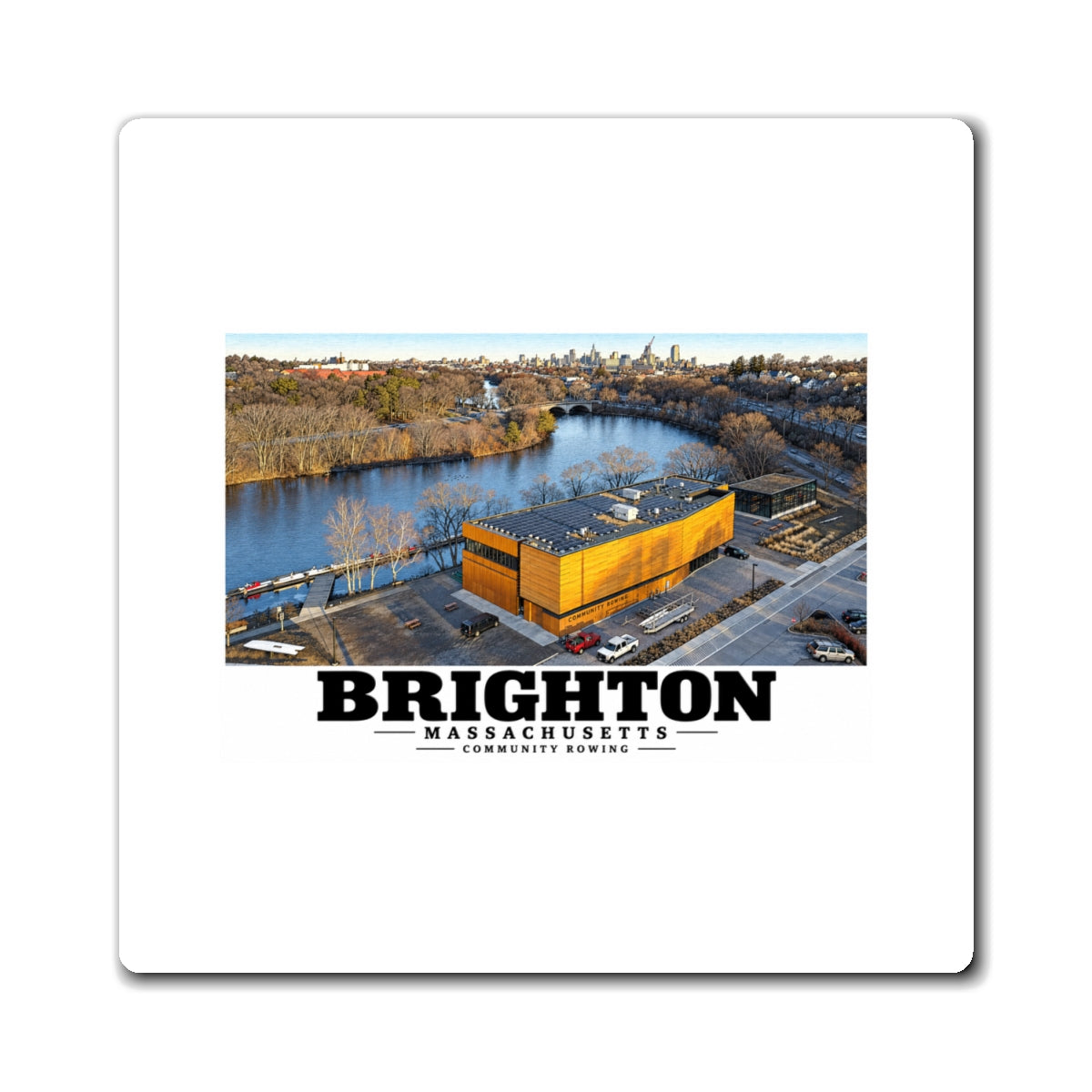 White rectangular magnet showing Community Rowing aerial building and river artwork and Brighton lettering