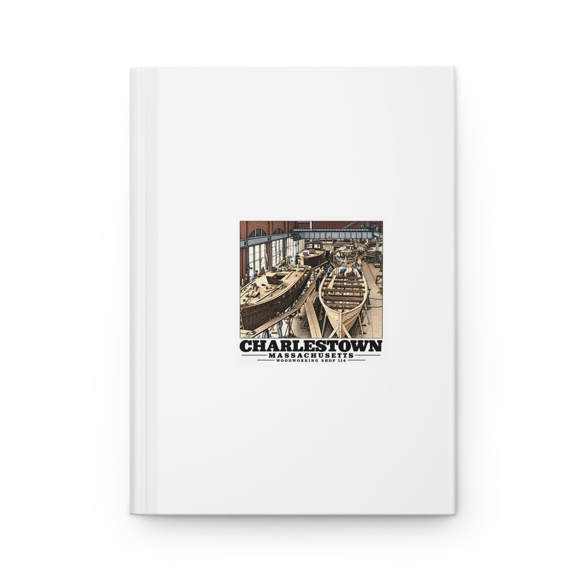 Front of matte hardcover journal with small-boat building artwork and Charlestown lettering