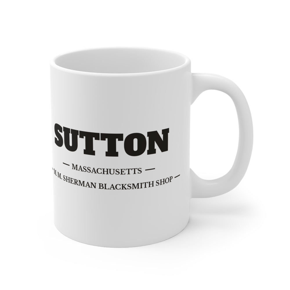 Sutton M. M. Sherman Blacksmith and Wheelwright Shop 11 oz ceramic mug — lifestyle view — Familiar History