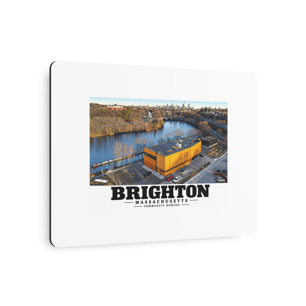 Angled view of Community Rowing aerial building and river metal print with its dark edge visible