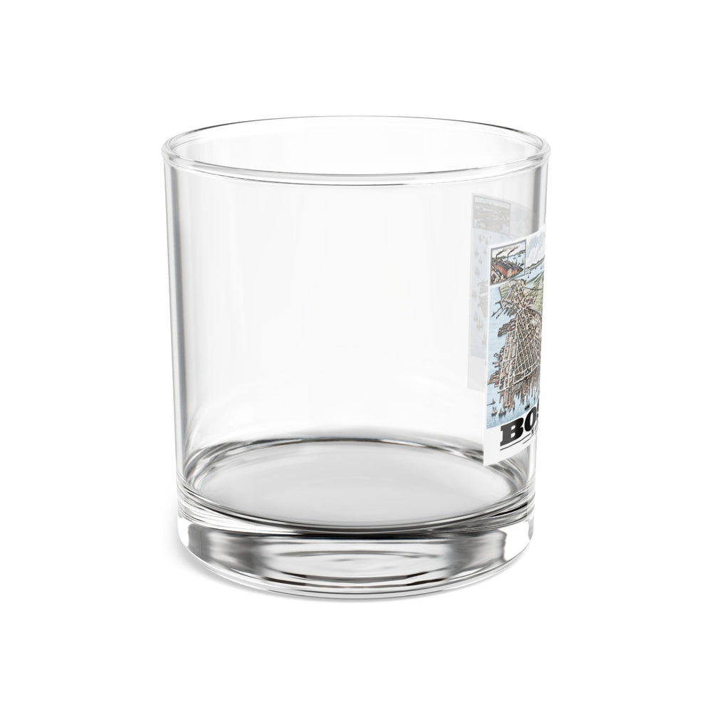Side view of clear rocks glass with mostly unprinted surface and part of East Boston bird-eye city and harbor panorama with inset views print at right