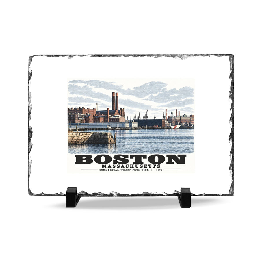 Rough-edged slate display on two black stands with Commercial Wharf waterfront buildings, twin chimneys and harbor water artwork and Boston lettering