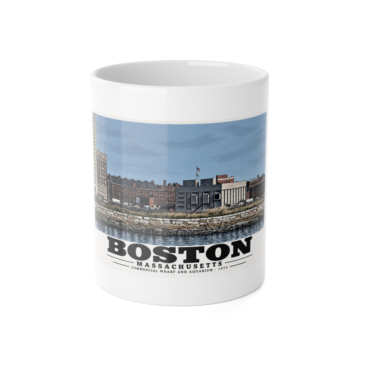 White mug showing Commercial Wharf and Aquarium waterfront buildings, stone seawall and harbor water artwork and Boston lettering