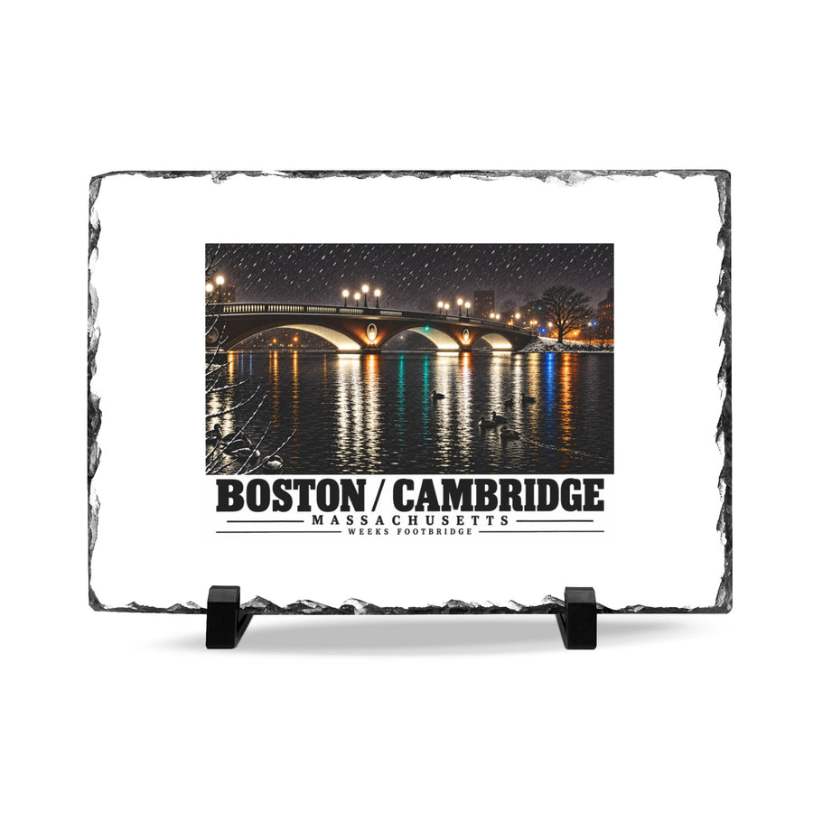 Rough-edged slate display on two black stands with Weeks Footbridge illuminated night view with water reflections artwork and Boston/Cambridge lettering