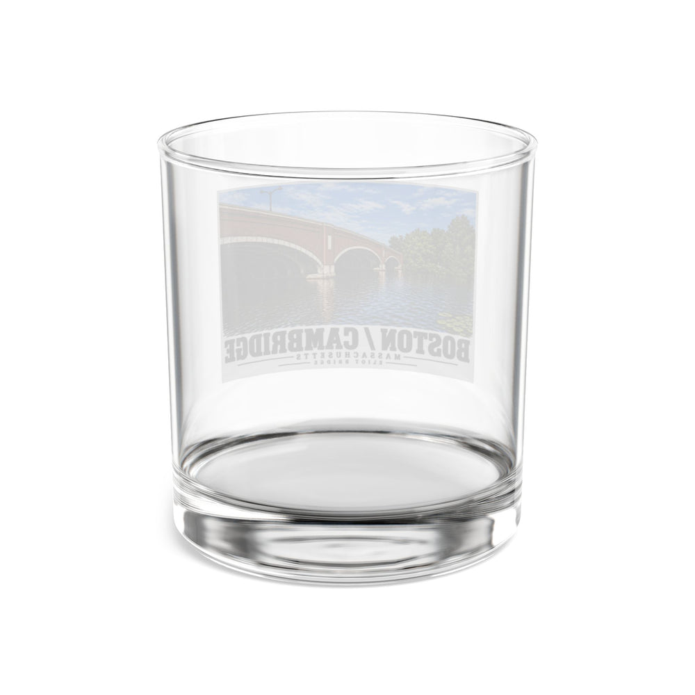 Rear view of clear rocks glass with Eliot Bridge close red brick arch view print and reversed lettering visible through the glass