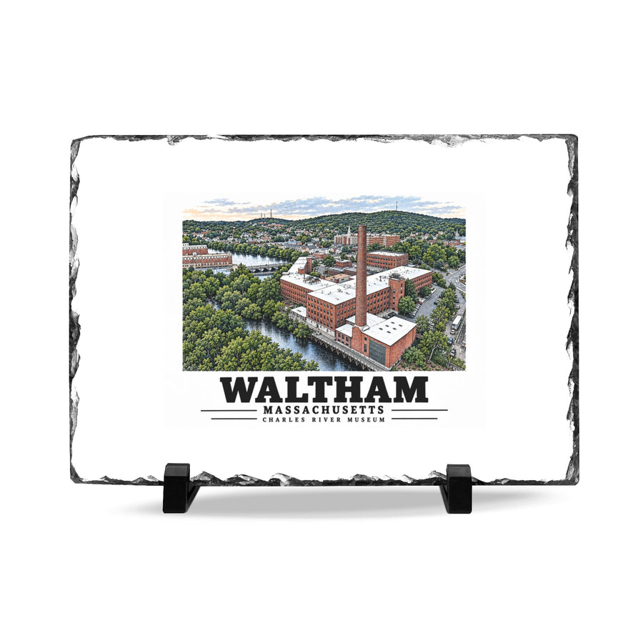 Front view of the Waltham Charles River Museum slate desk plaque on black stands.