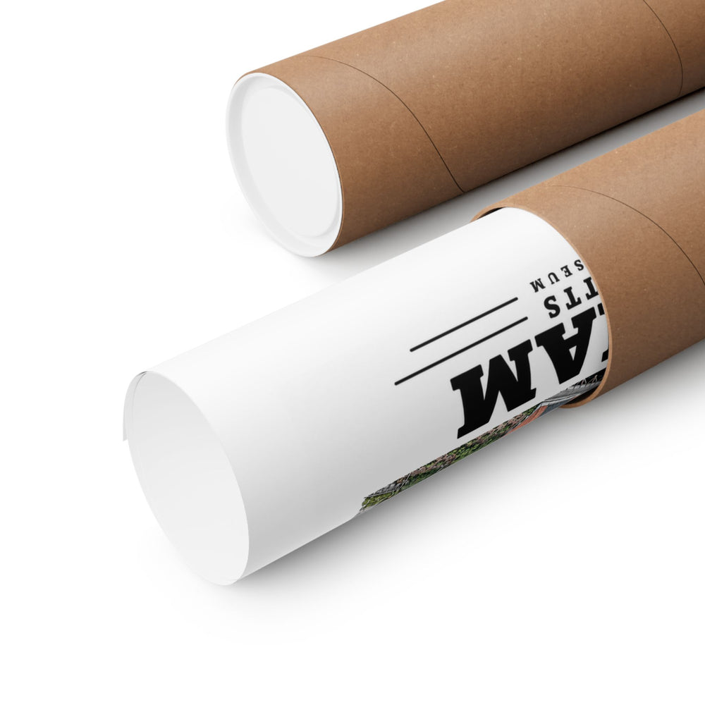 Rolled Charles River Museum poster beside a cardboard mailing tube, with printed typography visible.