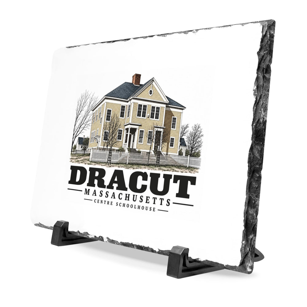 Angled front on display stands of Centre Schoolhouse slate desk plaque, with Dracut, Massachusetts artwork and lettering.