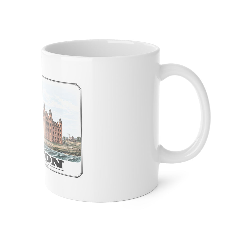 White mug with handle at right and part of the large symmetrical alms house building, grounds and figures print at left