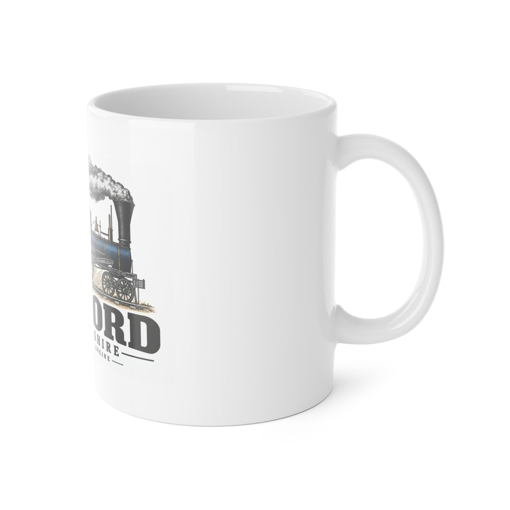 Right-handle side view of First Passenger Engine white ceramic mug, Concord, New Hampshire.
