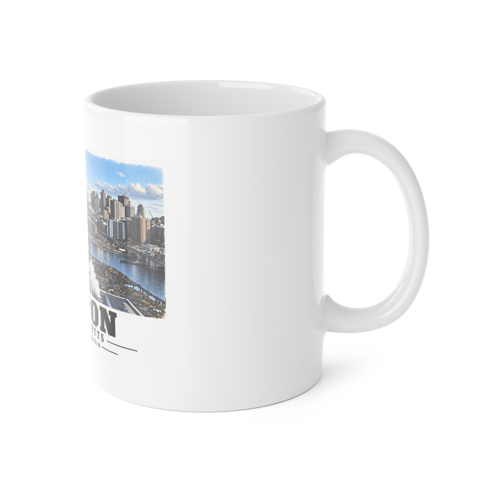 White mug with handle at right and part of the Boston skyline, cable-stayed bridge and Charles River basin print at left