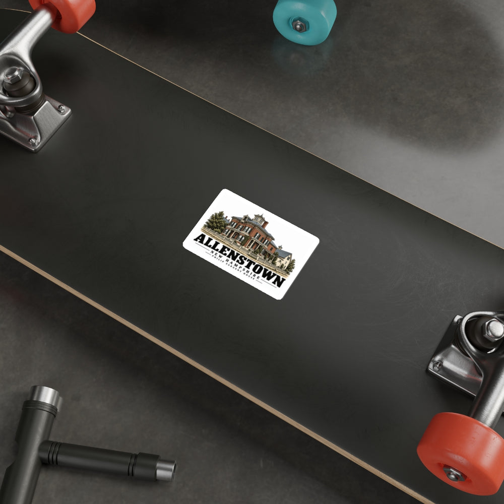Skateboard display of Philip Sargent House white die-cut sticker, with Allenstown, New Hampshire artwork and lettering.