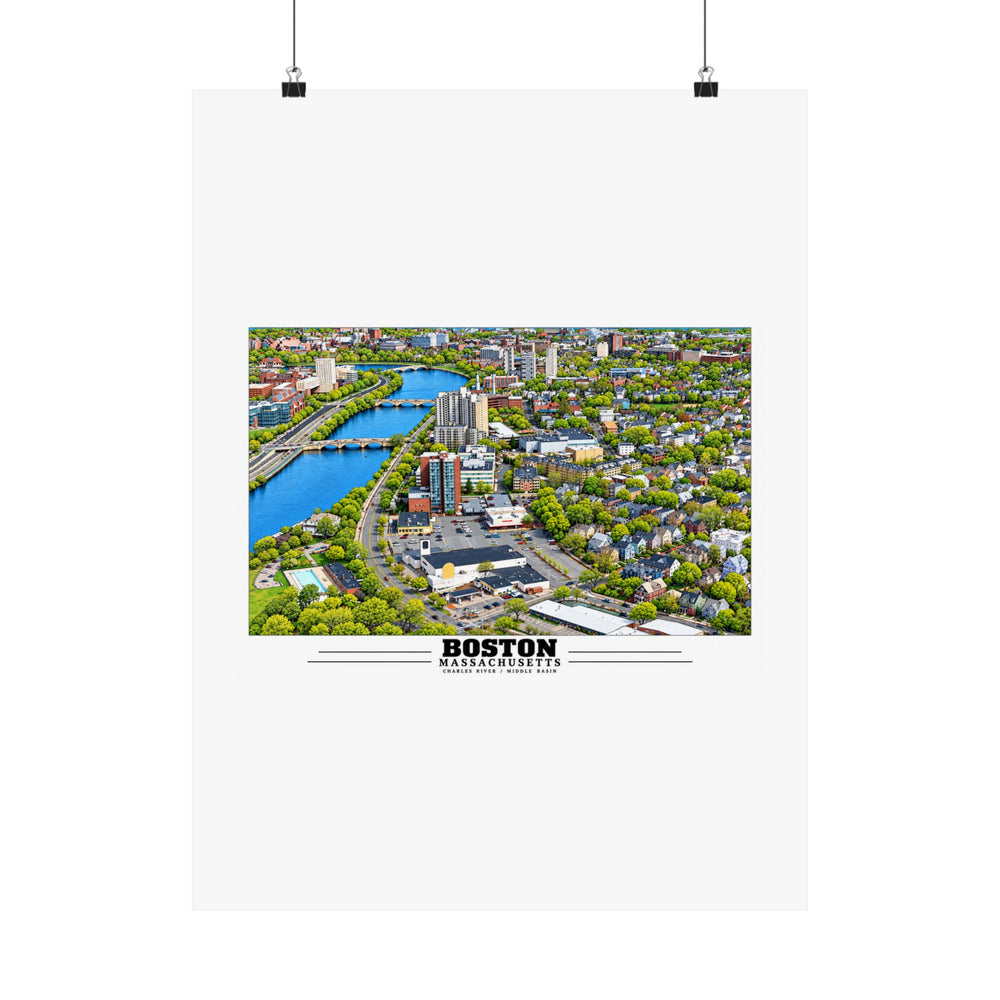 Charles River aerial city view with bridges, buildings and green trees poster with Boston lettering hanging from two binder clips