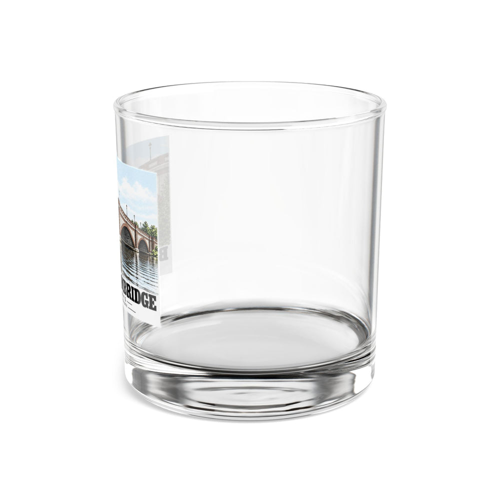 Side view of clear rocks glass with mostly unprinted surface and part of Anderson Memorial Bridge close arch view print at left