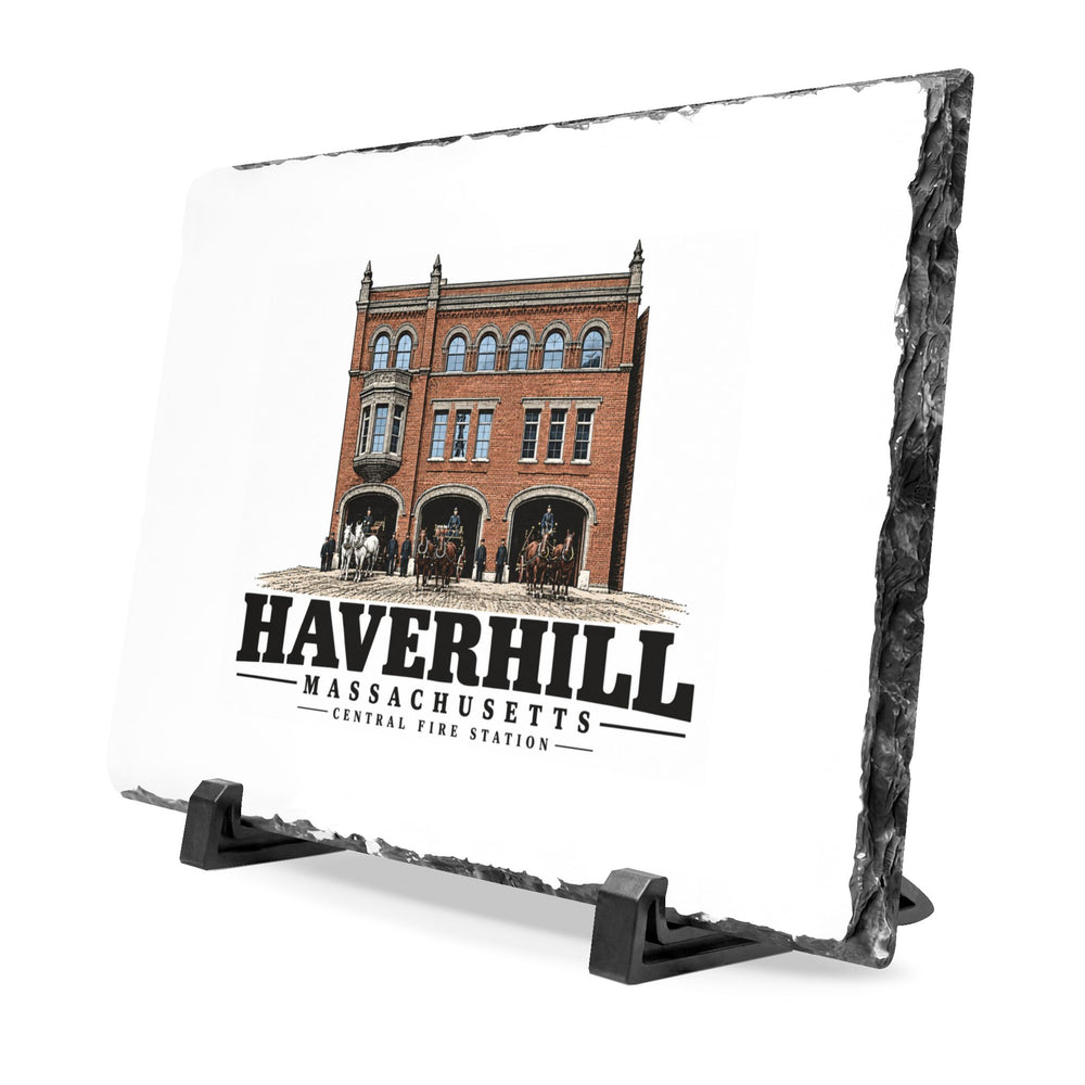 Angled front on display stands of Central Fire Station slate desk plaque, with Haverhill, Massachusetts artwork and lettering.