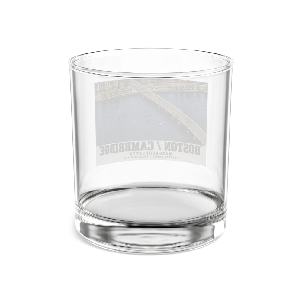 Rear view of clear rocks glass with Harvard Bridge aerial view with scullers on the Charles River print and reversed lettering visible through the glass