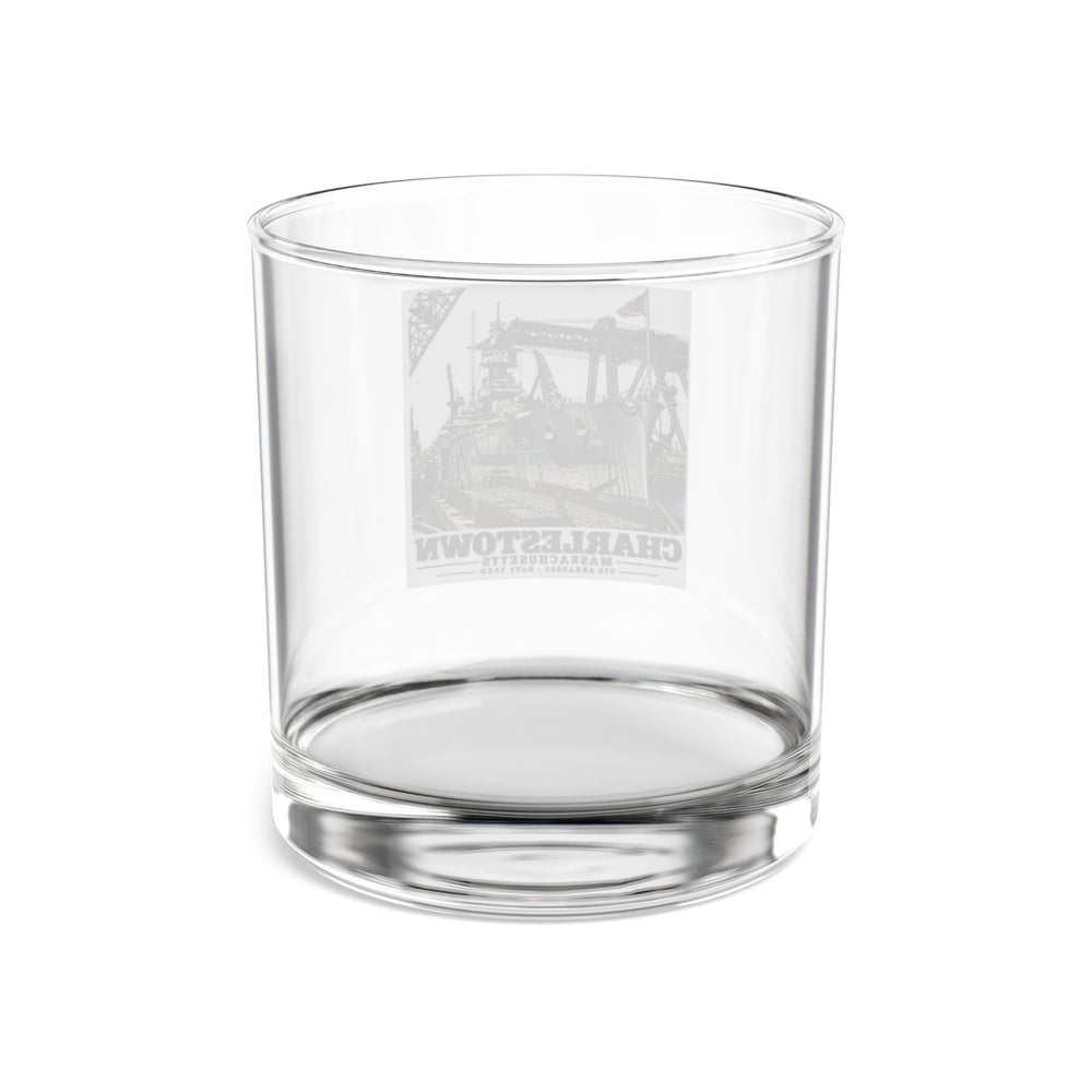 Rear of clear rocks glass showing reversed USS Arkansas artwork through the glass