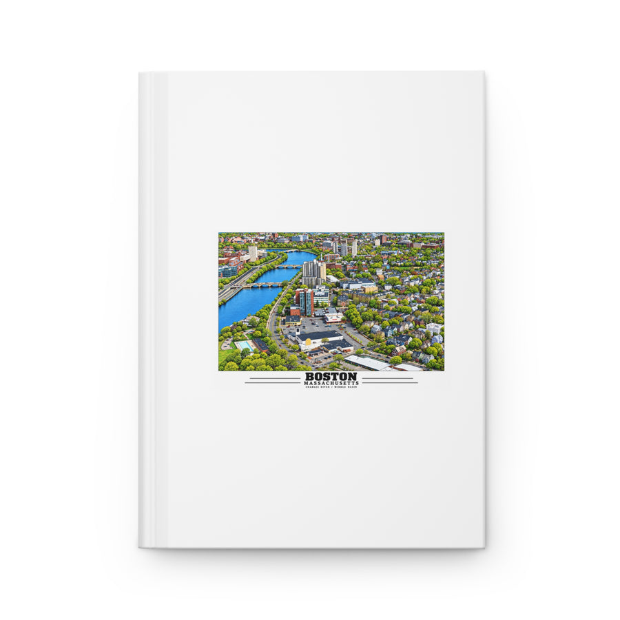 White hardcover journal with Charles River aerial city view with bridges, buildings and green trees artwork and Boston lettering