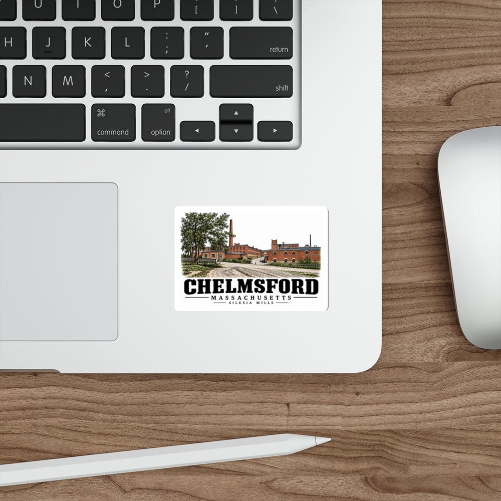 Laptop display of Silesia Mills white die-cut sticker, with Chelmsford, Massachusetts artwork and lettering.