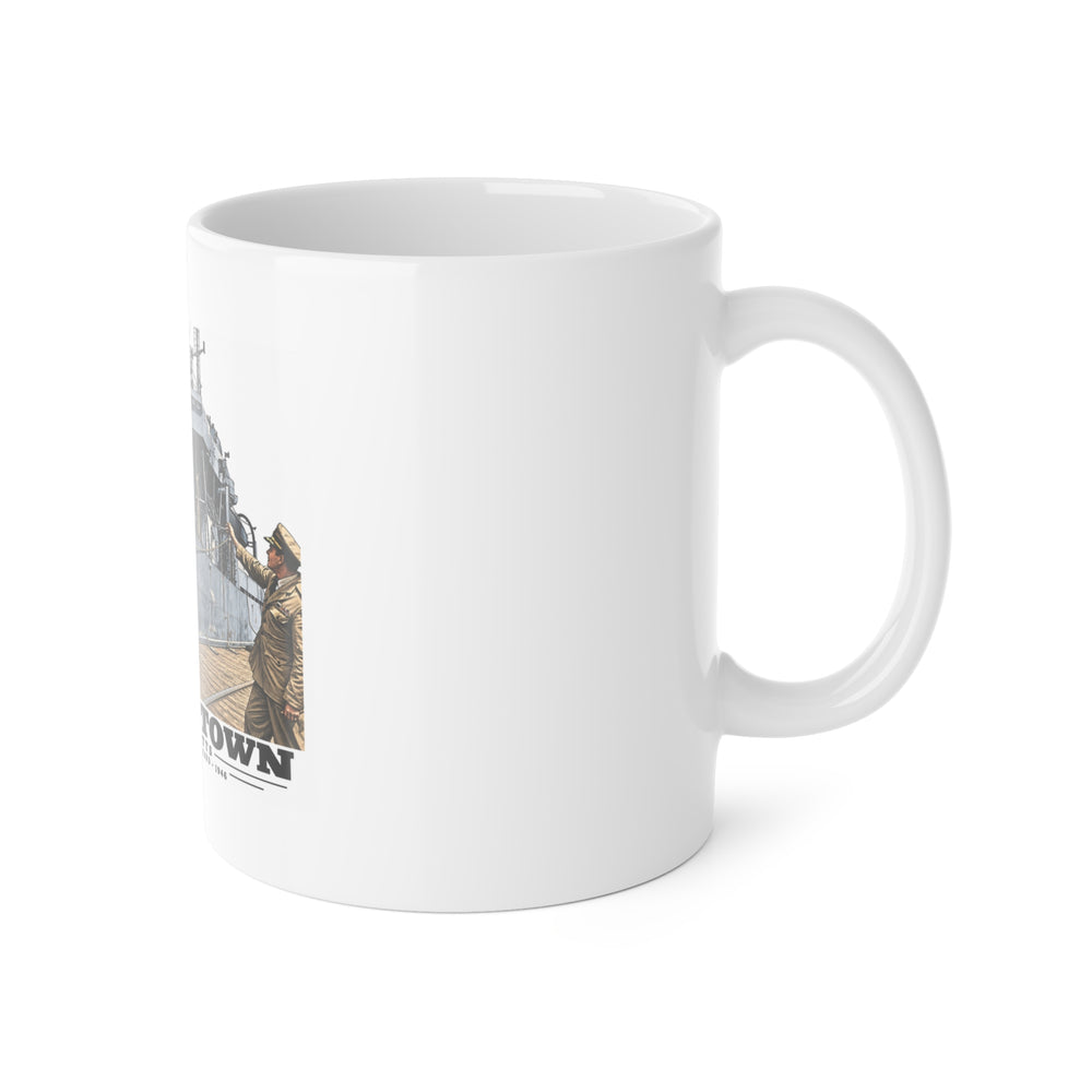 Right-handle view of the USS Braine ceramic mug, with the artwork wrapping around its left side.