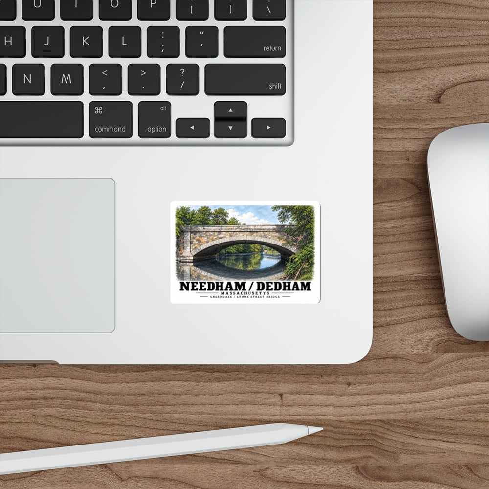 Sticker showing Greendale Avenue / Lyons Street Bridge stone arch and reflection artwork on a laptop beside its keyboard