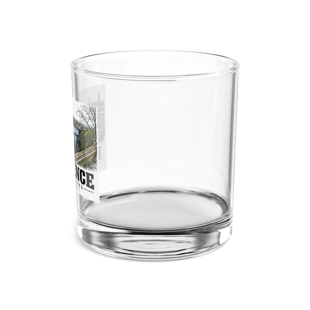 Left side of Spicket River rocks glass, with Lawrence, Massachusetts artwork and lettering.