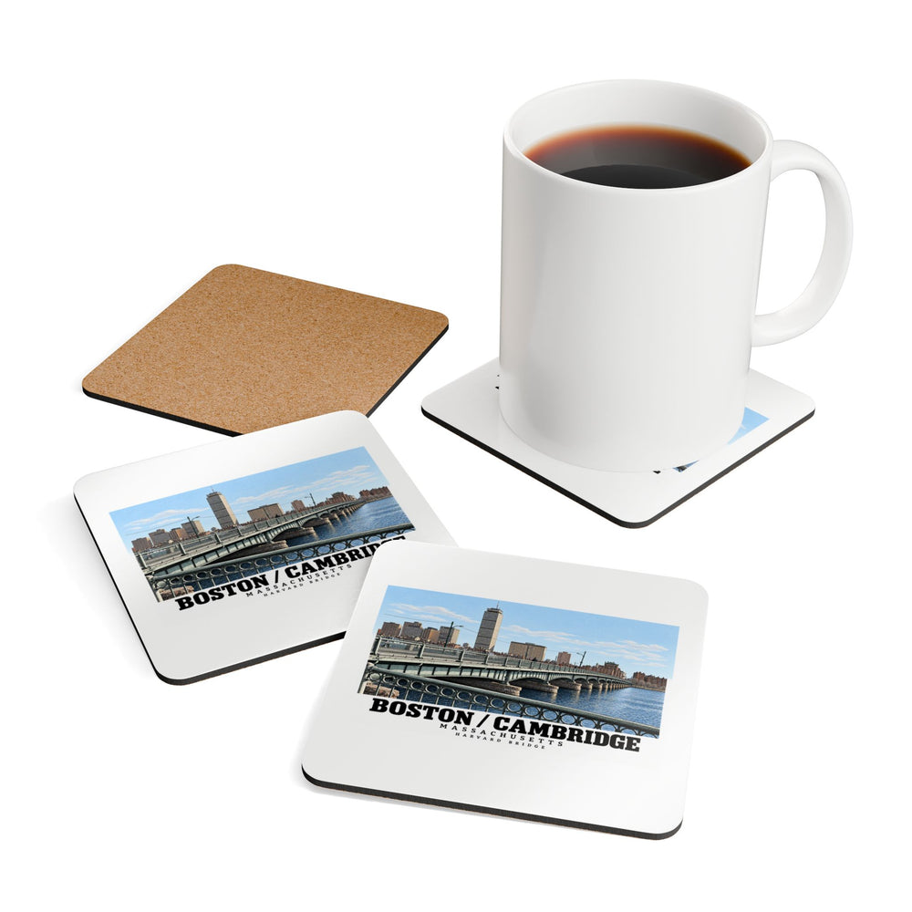 White mug resting on a coaster beside printed Harvard Bridge coaster fronts and a cork reverse