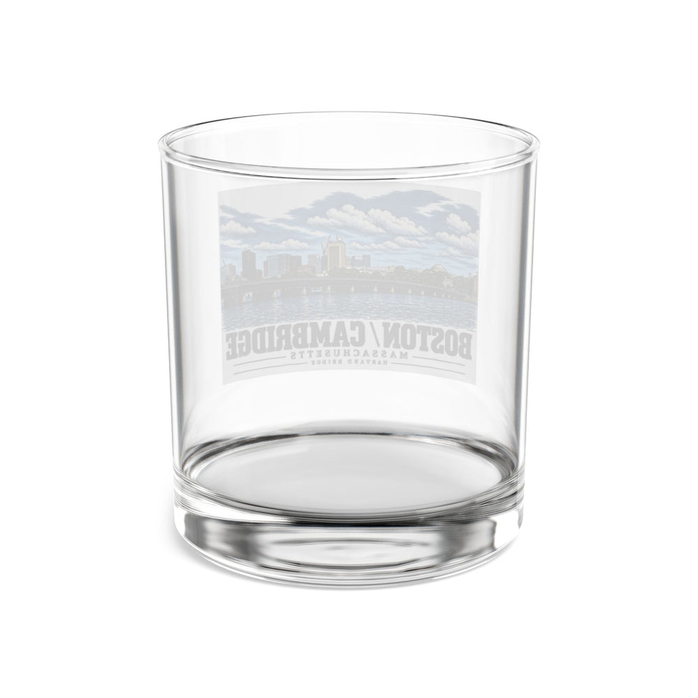 Rear view of clear rocks glass with Harvard Bridge river and skyline view print and reversed lettering visible through the glass