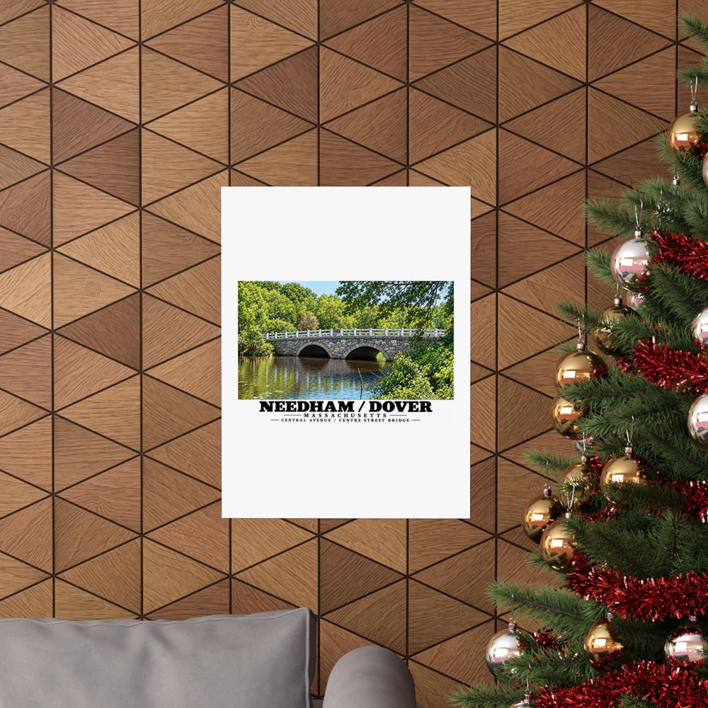 Central Avenue / Centre Street Bridge stone arches and river poster on a wood wall beside a decorated evergreen