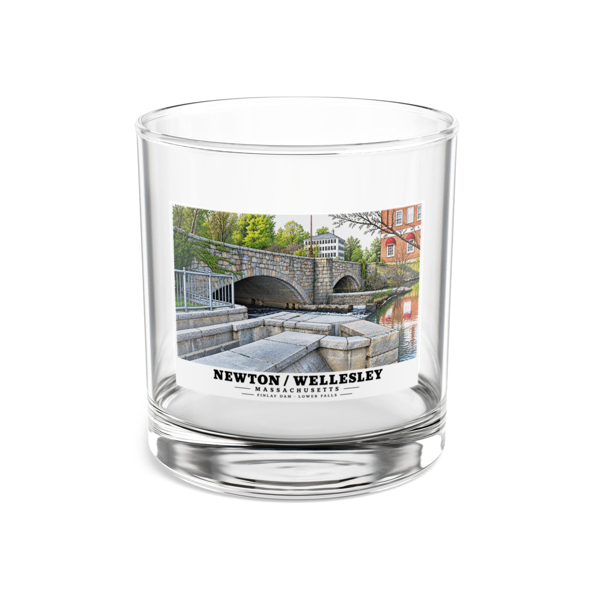 Clear rocks glass showing Finlay Dam stone arches and water artwork and Newton/Wellesley lettering
