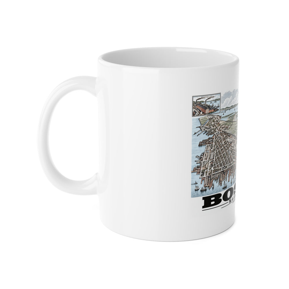 White mug with handle at left and part of the East Boston bird-eye city and harbor panorama with inset views print at right