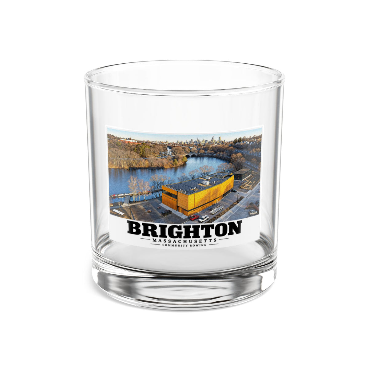 Clear rocks glass showing Community Rowing aerial building and river artwork and Brighton lettering