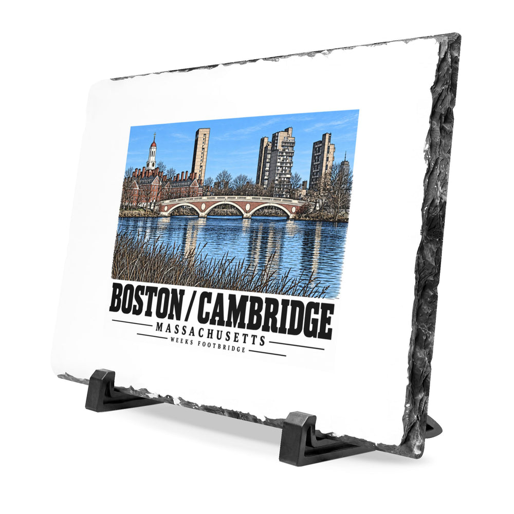 Angled rough-edged slate display on black stands showing Weeks Footbridge stone arches and riverside towers artwork
