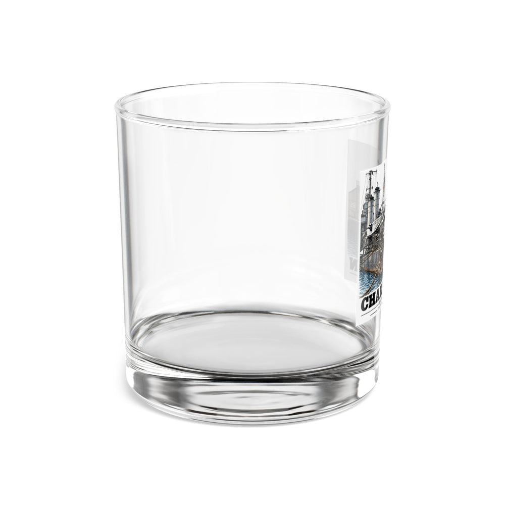 Right side of clear rocks glass showing edge of USS Nelson artwork