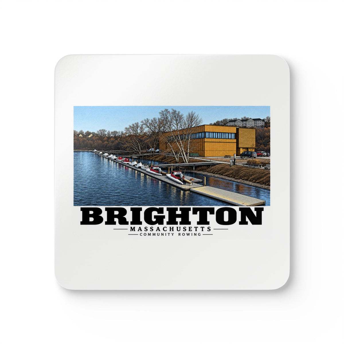 White square coaster showing Community Rowing building, dock and boats artwork and Brighton lettering