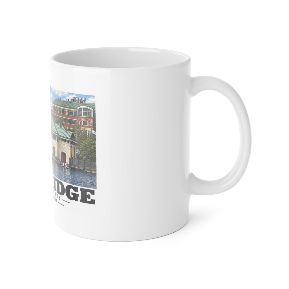 Right-handle view of the white ceramic mug with DeWolfe Boathouse artwork partly visible.