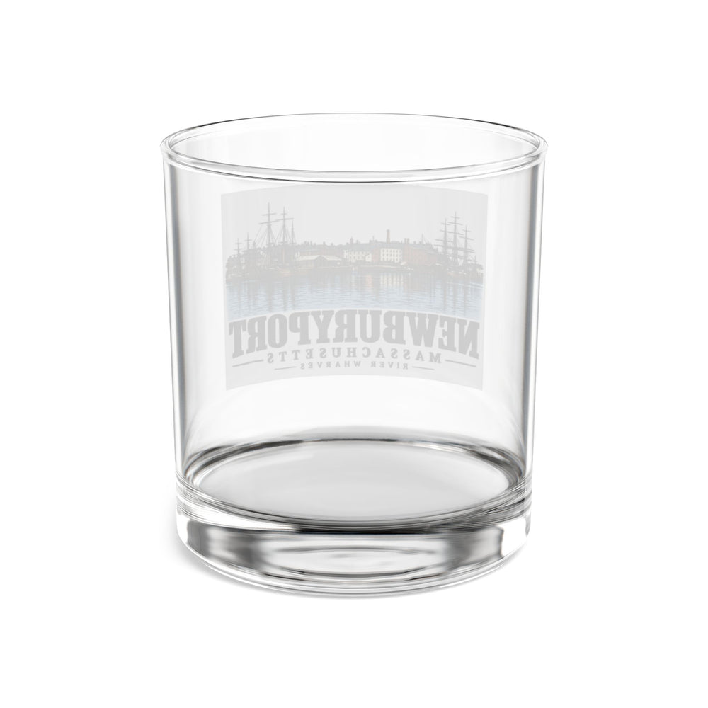Transparent reverse of River Wharves rocks glass, with Newburyport, Massachusetts artwork and lettering.
