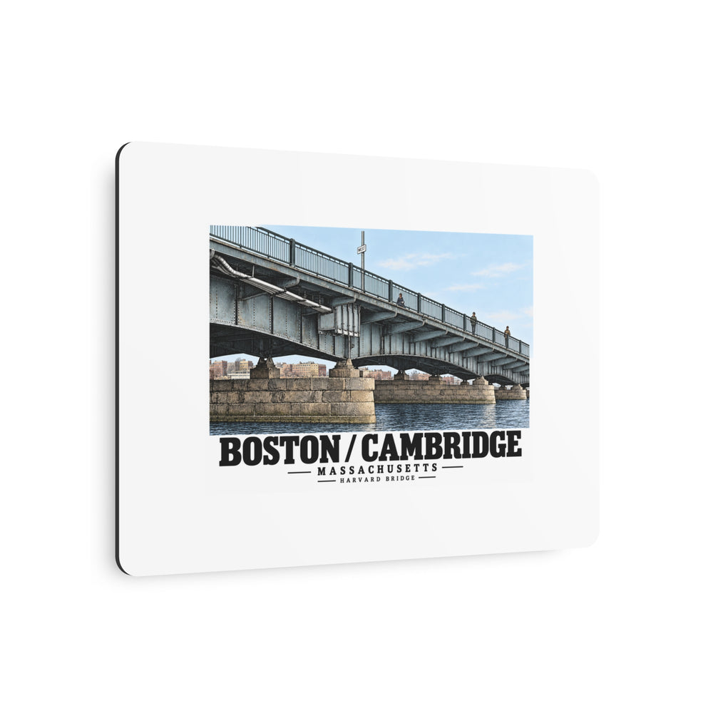 Angled metal sign showing Harvard Bridge artwork and Boston/Cambridge lettering and the edge