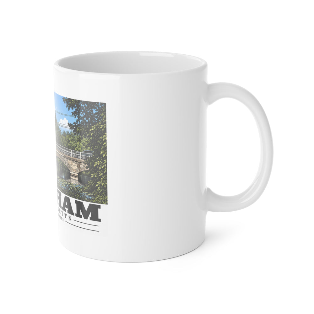Right-handle view of the white ceramic mug with Newton Street Bridge artwork partly visible.