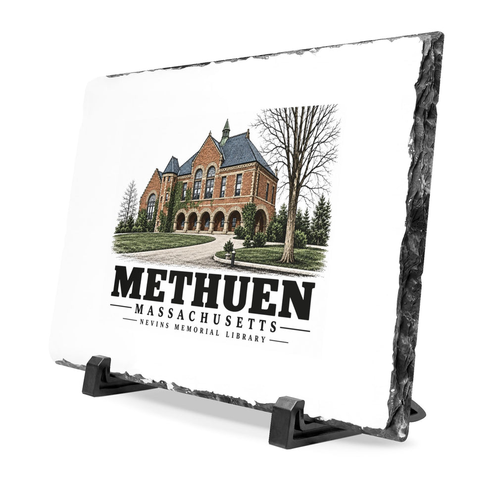 Angled front on display stands of Nevins Memorial Library slate desk plaque, with Methuen, Massachusetts artwork and lettering.