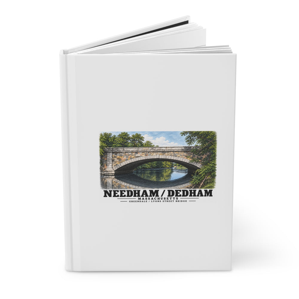 Partly opened white hardcover journal showing Greendale Avenue / Lyons Street Bridge stone arch and reflection artwork on the front