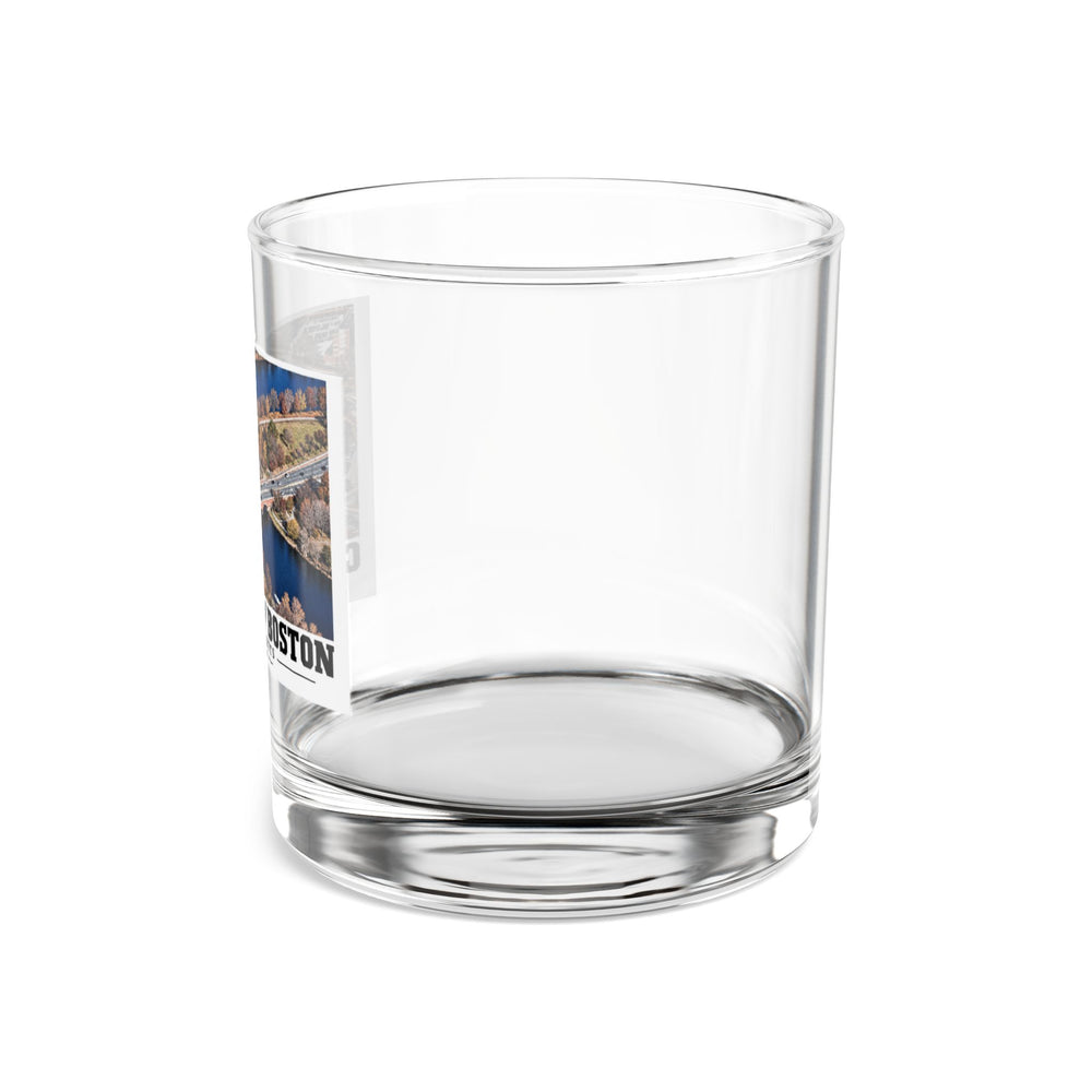 Side view of clear rocks glass with mostly unprinted surface and part of Eliot Bridge aerial river view print at left