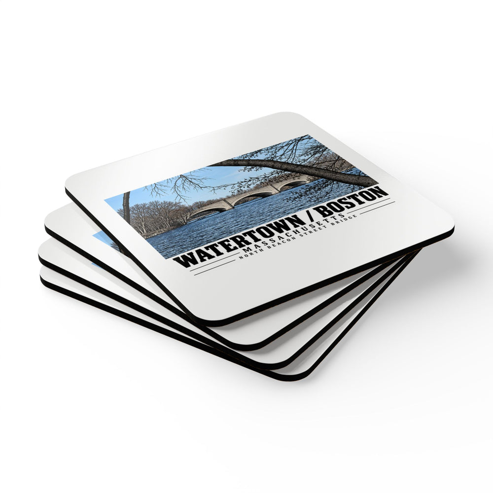 Stack of square coasters with North Beacon Street Bridge stone arches framed by a bare tree artwork visible on the top coaster