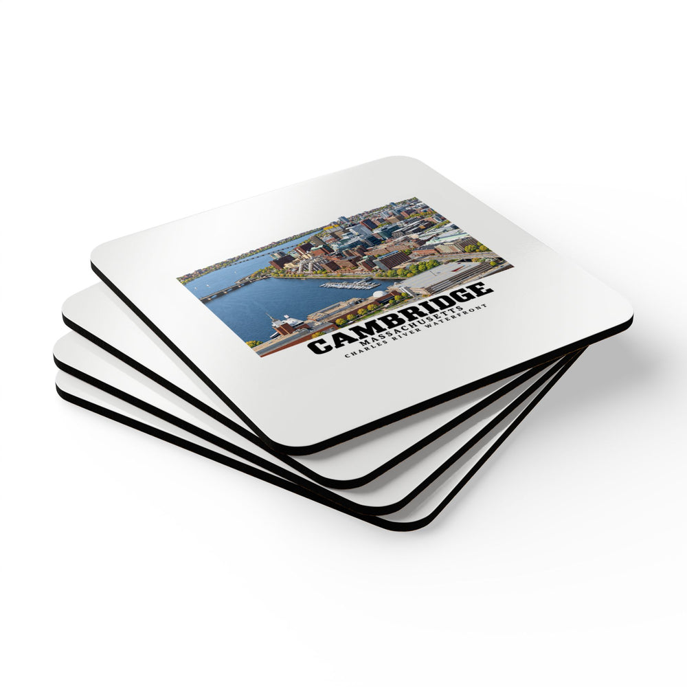 Stack of square coasters with Cambridge Charles River waterfront aerial city view artwork visible on the top coaster
