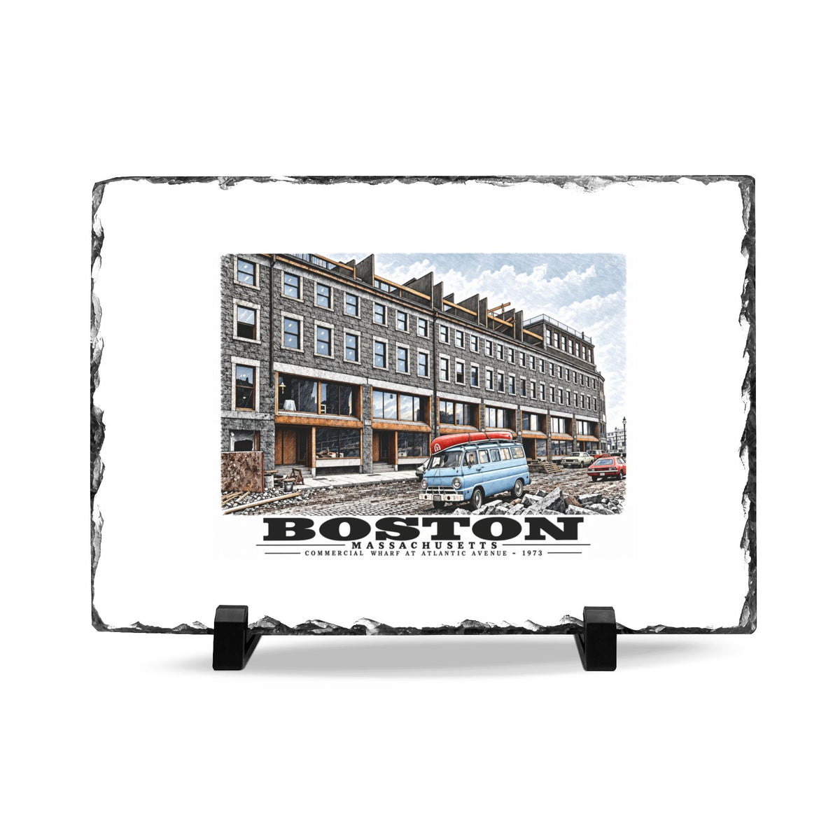 Rough-edged slate display on two black stands with Commercial Wharf Street buildings, blue van and renovation debris artwork and Boston lettering