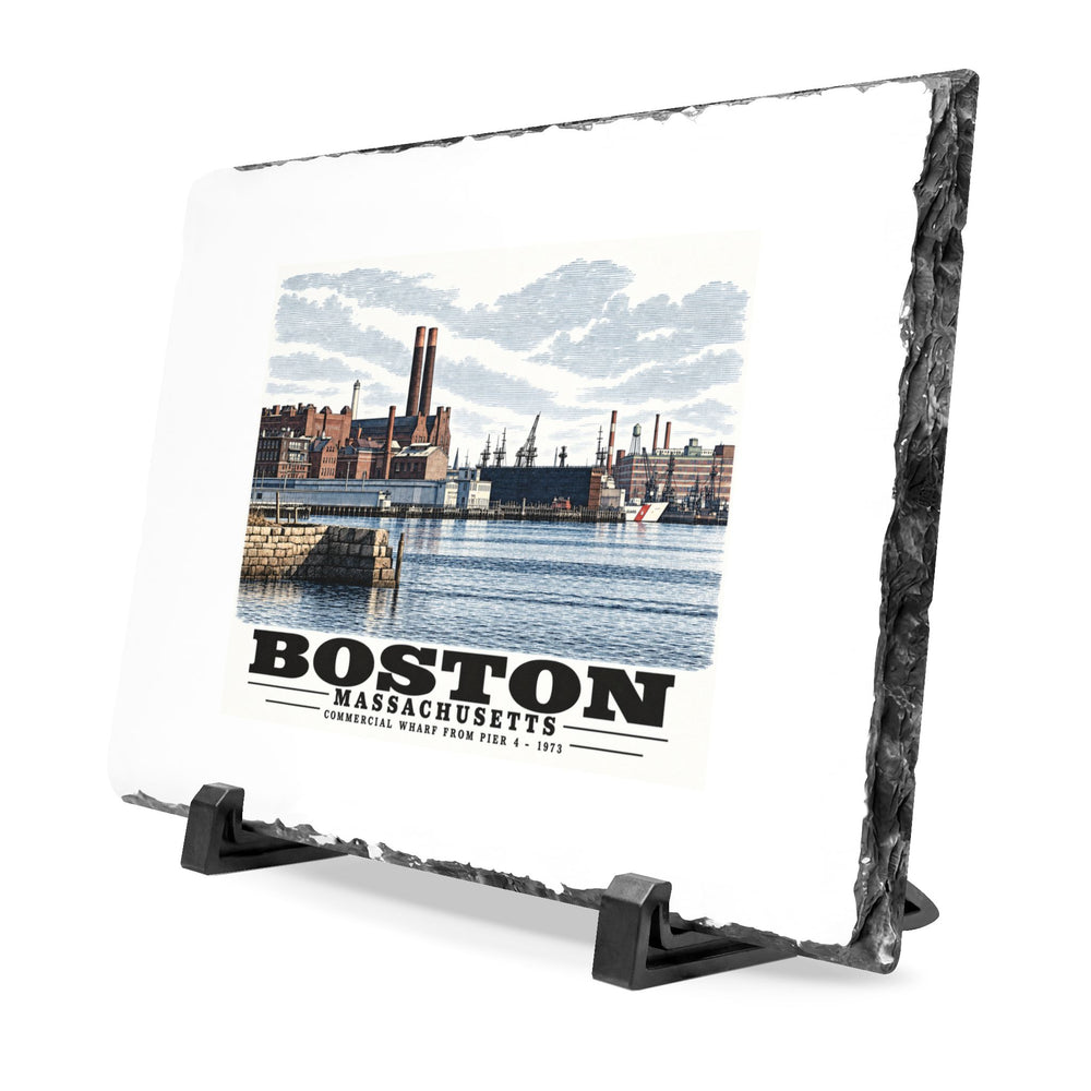 Angled rough-edged slate display on black stands showing Commercial Wharf waterfront buildings, twin chimneys and harbor water artwork