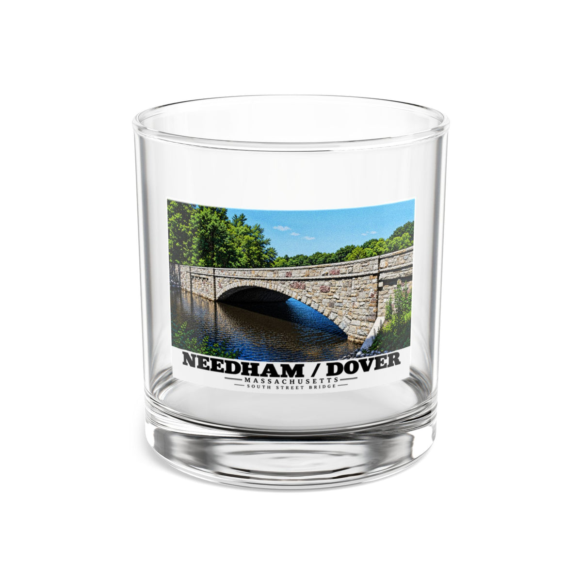 Clear rocks glass showing South Street Bridge stone arch and river artwork and Needham/Dover lettering