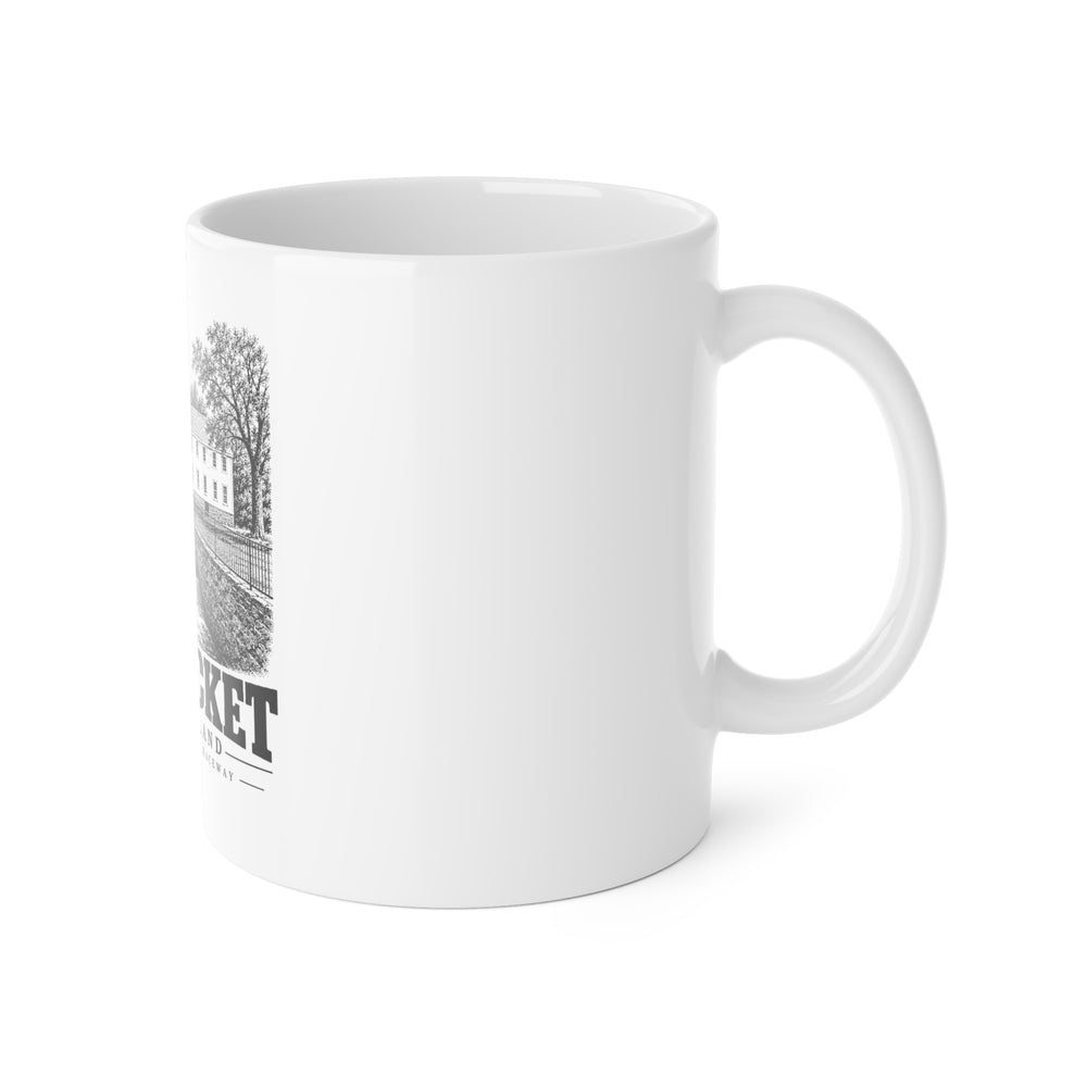 Right side of Pawtucket Old Slater Mill and Raceway ceramic mug showing the handle and edge of the print