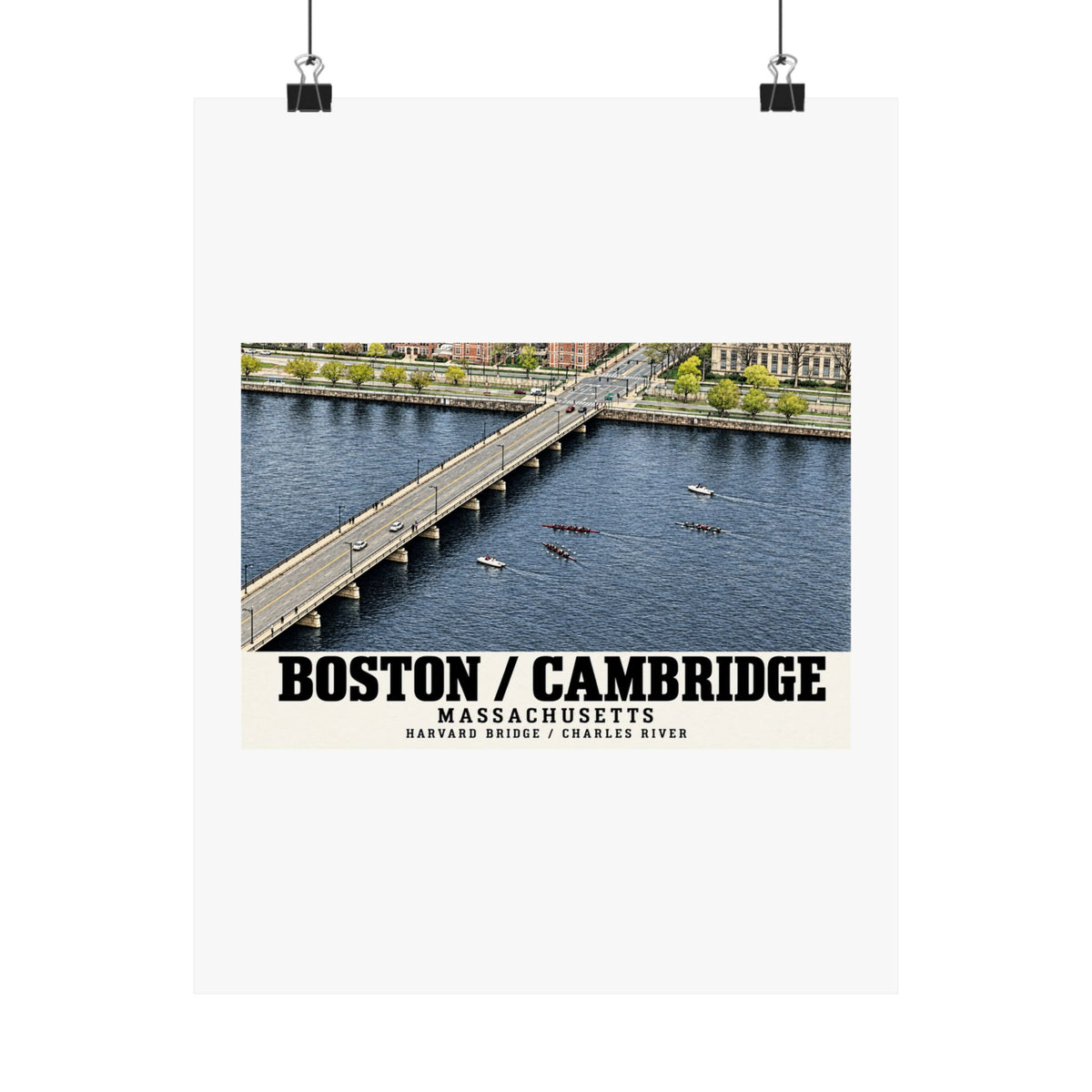 Harvard Bridge aerial view with scullers on the Charles River poster with Boston/Cambridge lettering hanging from two binder clips